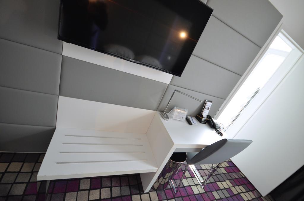 Kyriad Prestige Centre Hotel 4*